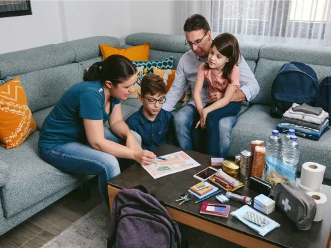Family preparing wild fire evacuation plan.