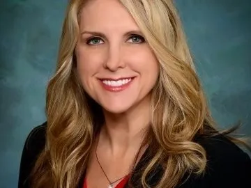 Kristi Baker's professional headshot.