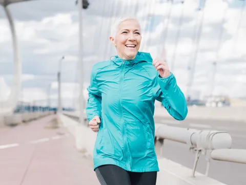 woman-jogging-and-smiling