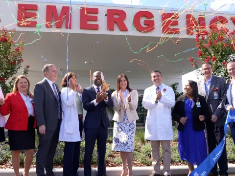 AdventHealth and community leaders cut the ribbon on the new AdventHealth Millenia ER.