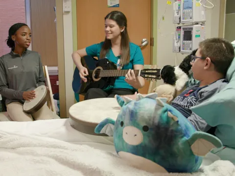 Patients receive music therapy.