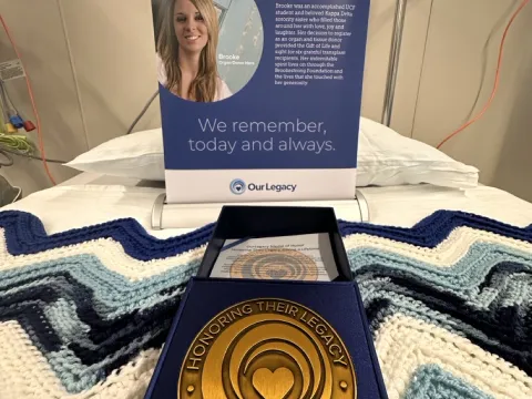 OurLegacy Center hero bay display with donor hero Brooke Dawkins