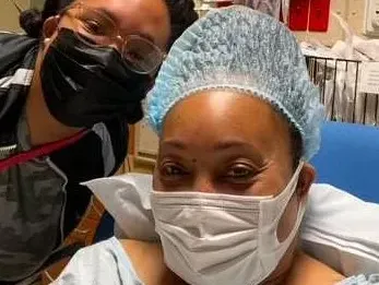Javonne WIlliams with her daughter just before going into her chemotherapy port surgery on January 18, 2022.