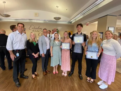 Three high school seniors received the Ethan Wilson Memorial Scholarship from the medical staff at AdventHealth New Smyrna Beach.
