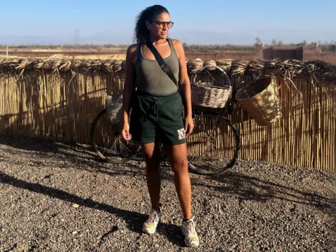 Sharlene after bariatric surgery, standing outdoors