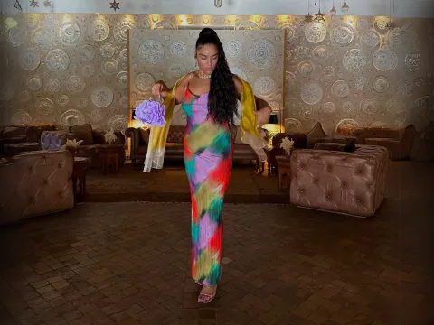 Sharlene wearing a colorful dress after bariatric surgery