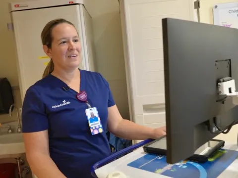 TJ Weaver at work in the AdventHealth Celebration pediatric emergency room