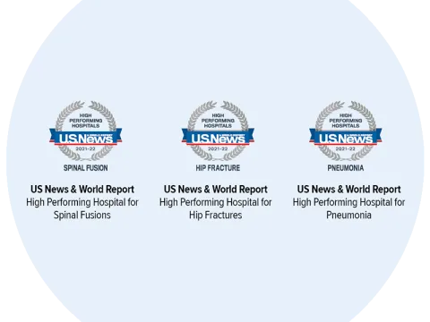 Three US News award logos within a circle