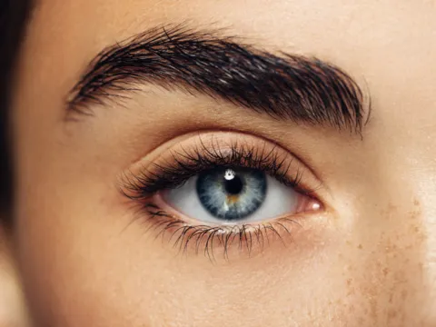A close-up of a woman's eye.