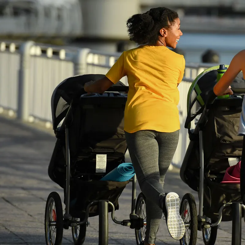 Mothers on Morning Run with their Children