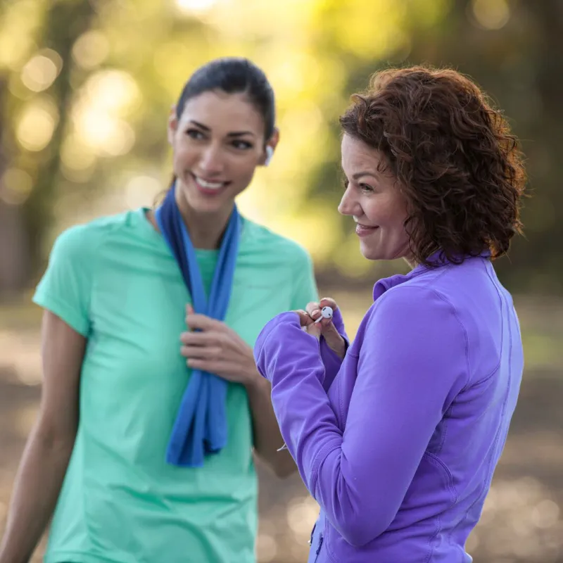 Two women taking a break during a run