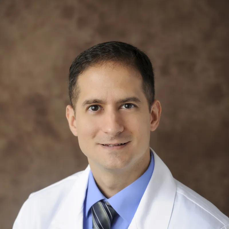 Professional headshot of Enrique Vega