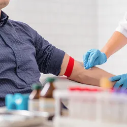 A man gets blood drawn.