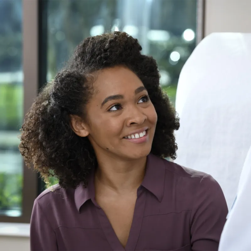 Young Woman Visiting Doctor