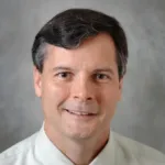 John T Littell, MD