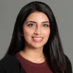 Amina Karim, DC