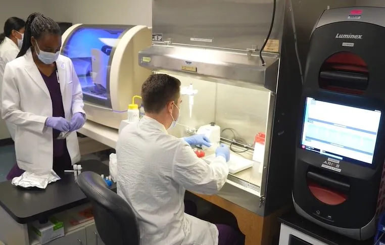 The AdventHealth clinical team works in lab researching and developing this new brain-eating amoeba test that can diagnose within three hours.