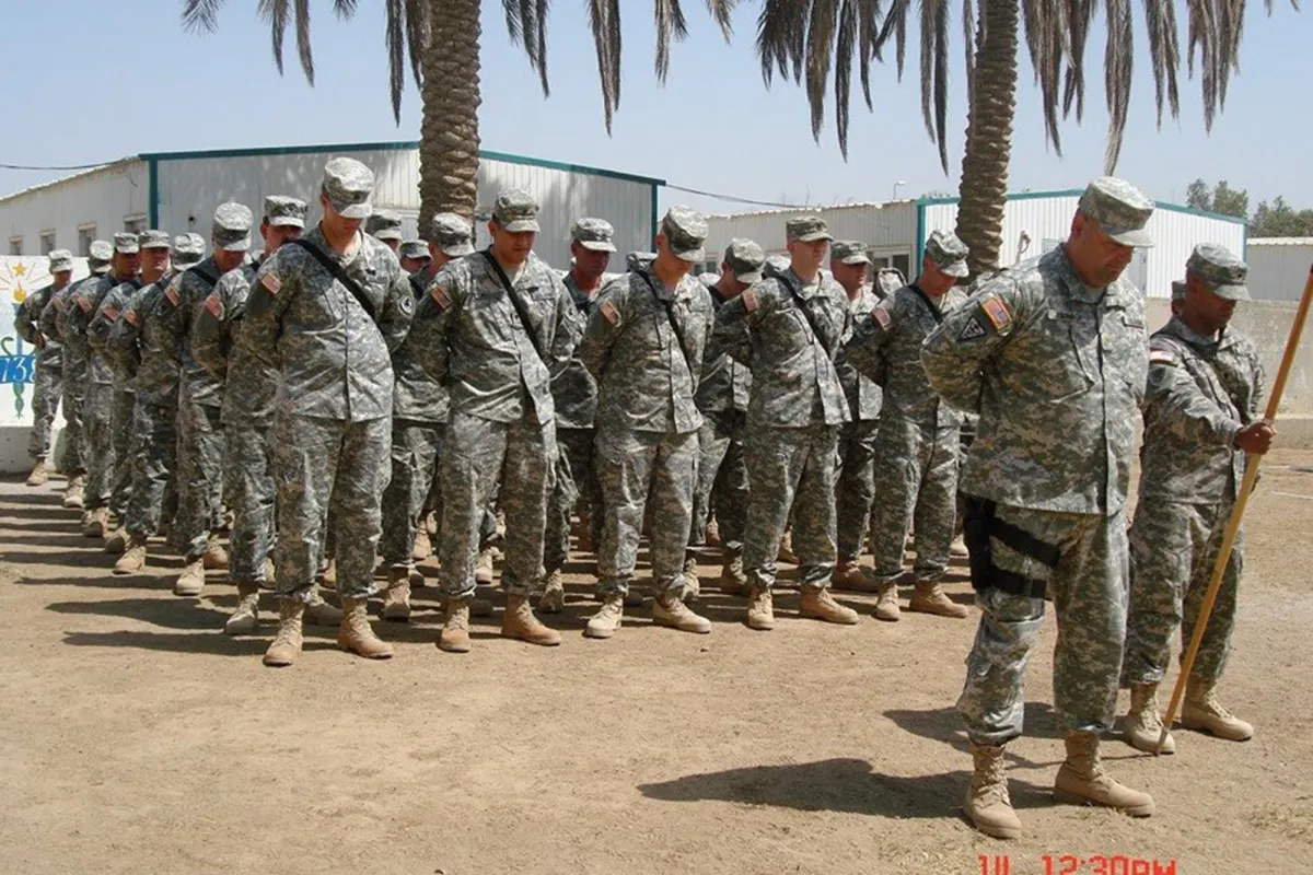 Gordon Wesley (front row, third from left) in formation with his 1171st Area Support Medical Company stationed in Baghdad, Iraq.