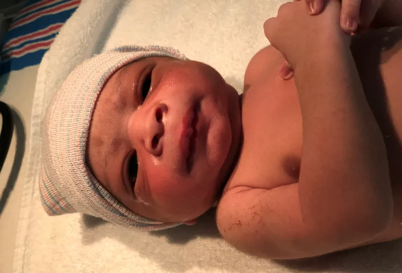 Baby J'Lon looks at the camera