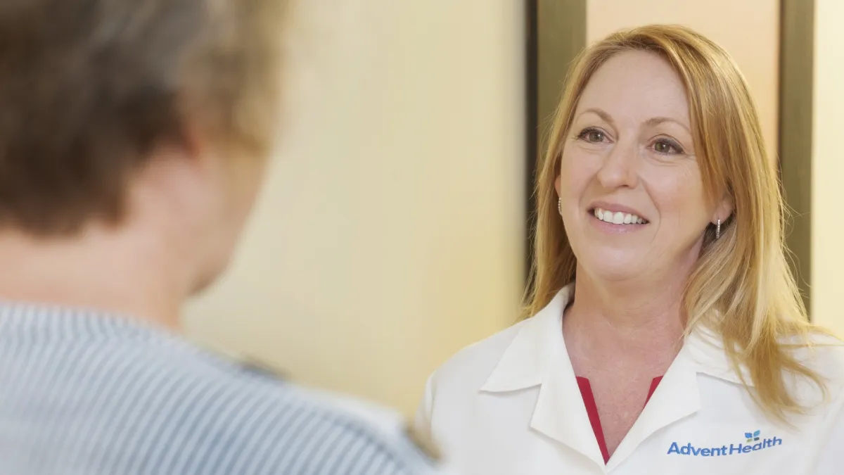 Dr. Charlotte Brookes with a patient