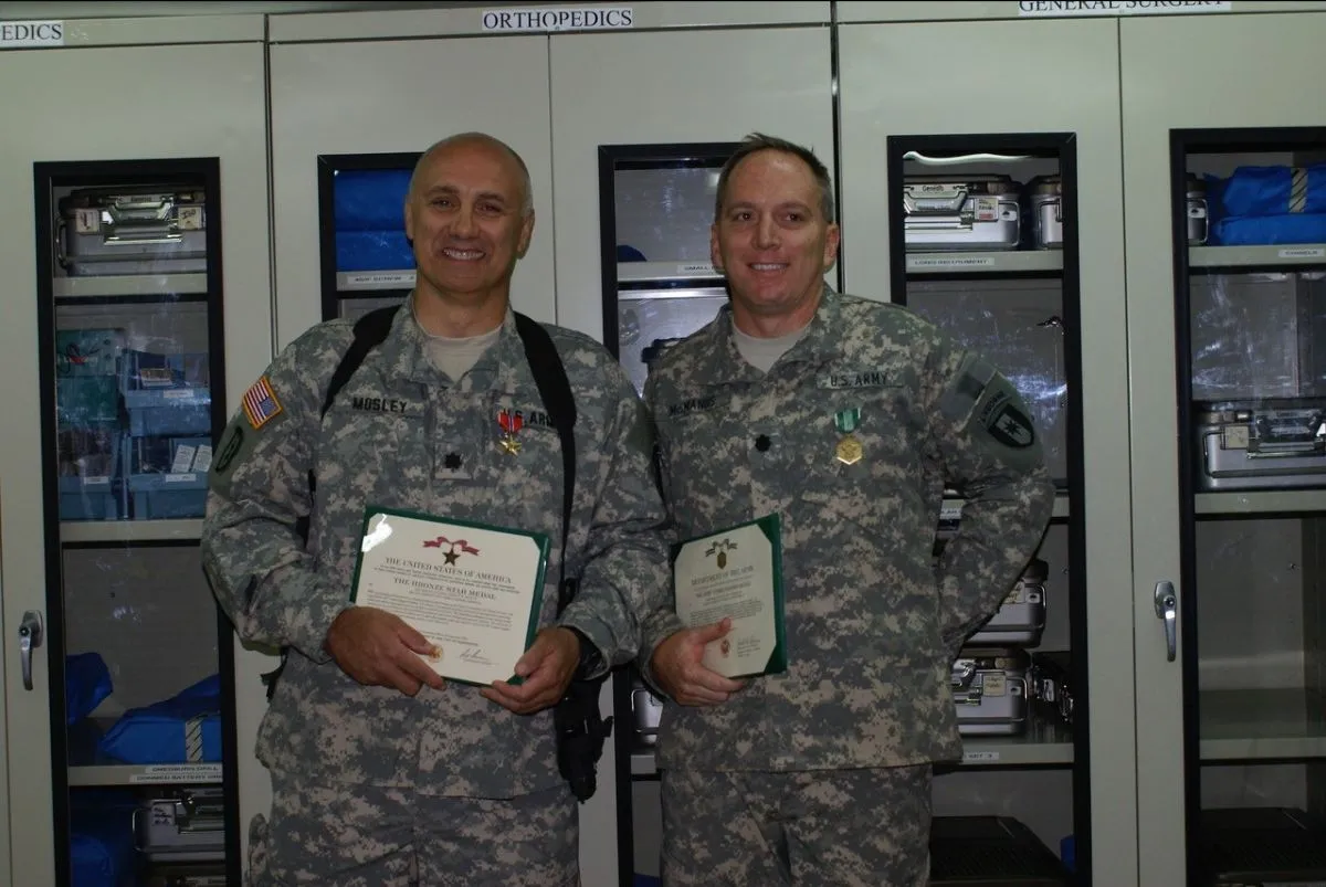 Dr. E. Wayne Mosley (left) was awarded a Bronze Star for his service. He also was awarded the Combat Medic Badge and Combat Action Badge. Photo Courtesy of Dr. E. Wayne Mosley