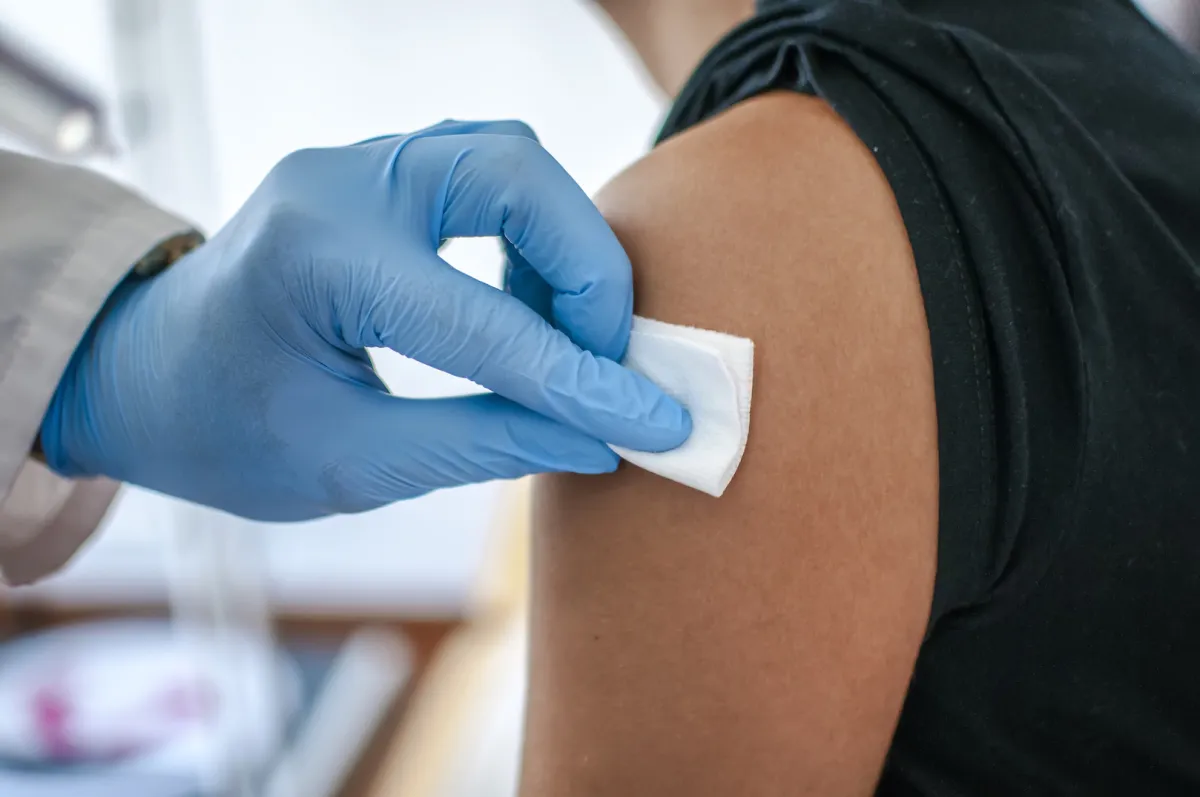 Health care workers in roles with high exposure risk and the elderly in long-term care facilities will be first to receive the vaccine.