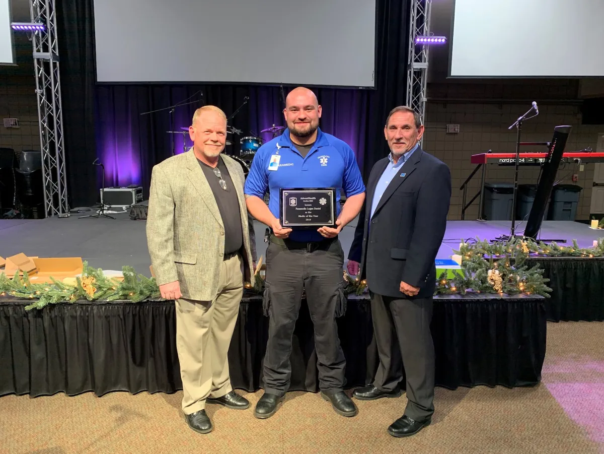 Gordon Paramedic of the Year recipient holding his award