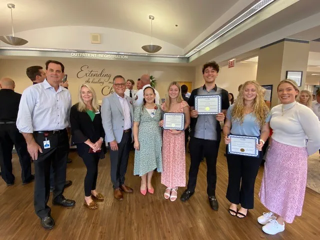 Three high school seniors received the Ethan Wilson Memorial Scholarship from the medical staff at AdventHealth New Smyrna Beach.