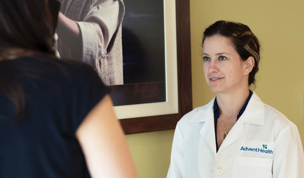 Dr. Sally Smalley examines a patient