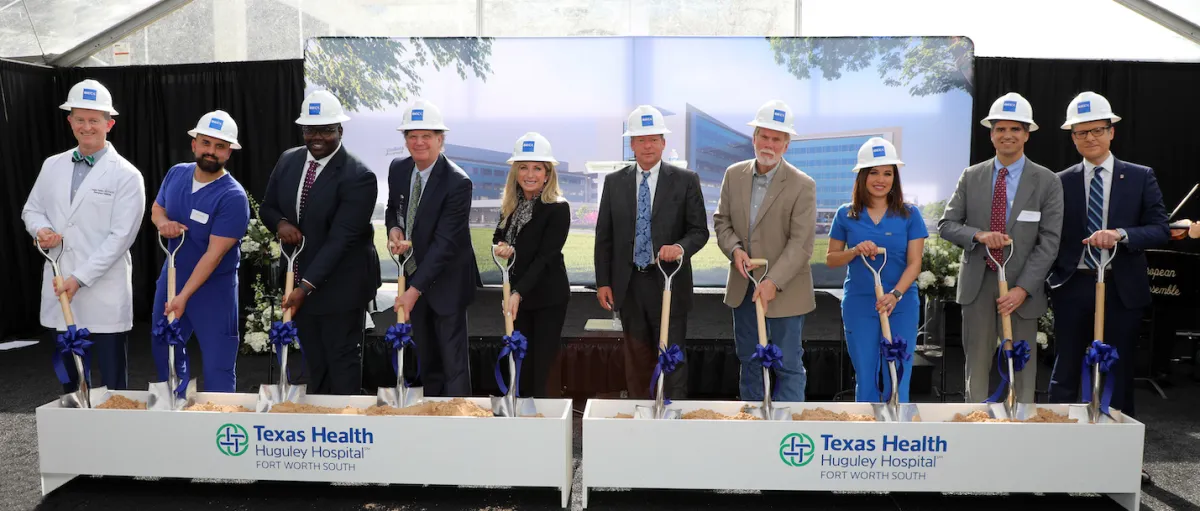 Community leaders, elected officials, staff and executives gather to break ground on new patient care tower.