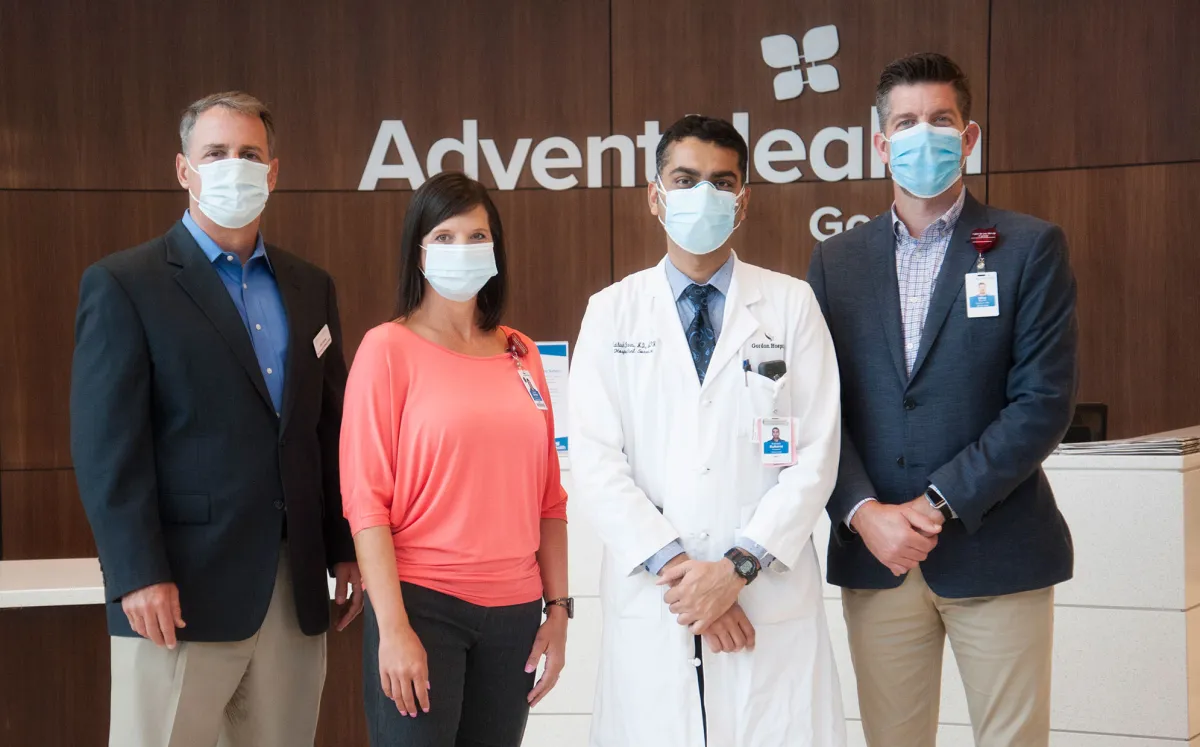 Kulkarni with AdventHealth staff