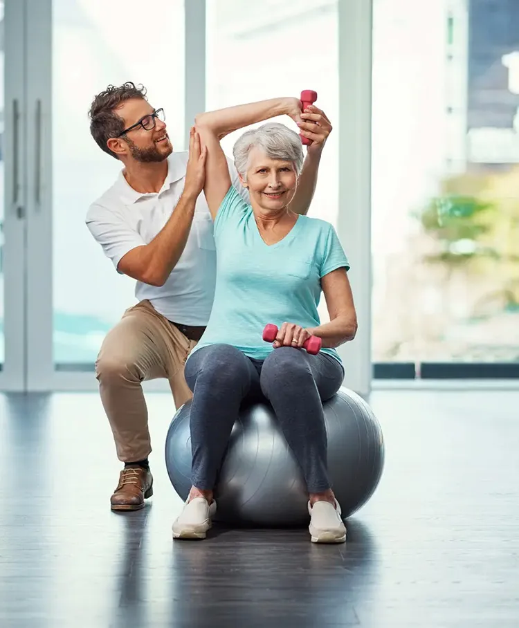 Physical therapy aide with a patient
